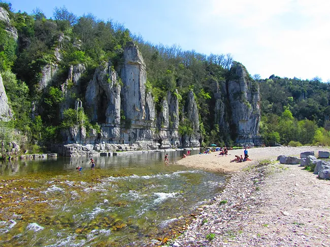 View on a pebble beach of the Ardeche gorges