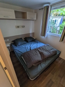 Bedroom with double bed for this mobile home rental
